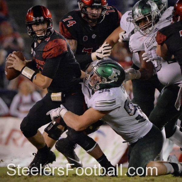 Eastern Michigan outside linebacker Maxx Crosby makes a critical tackle