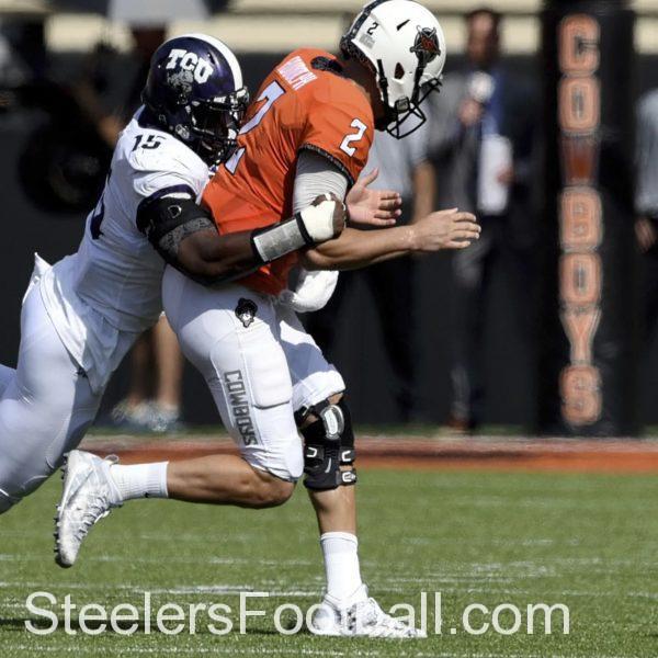 TCU's Ben Banogu sacks the quarterback against Oklahoma in a Big 12 showdown