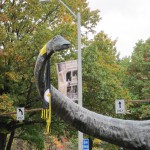 Dippy the Diplodocus (scientific name: Diplodocus carnegii) outside the Carnegie Museum, wearing a Steeler scarf. His skeleton, residing inside Dinosaur Hall in the museum, is one of Carnegie’s oldest fossils, over 100 years old.
